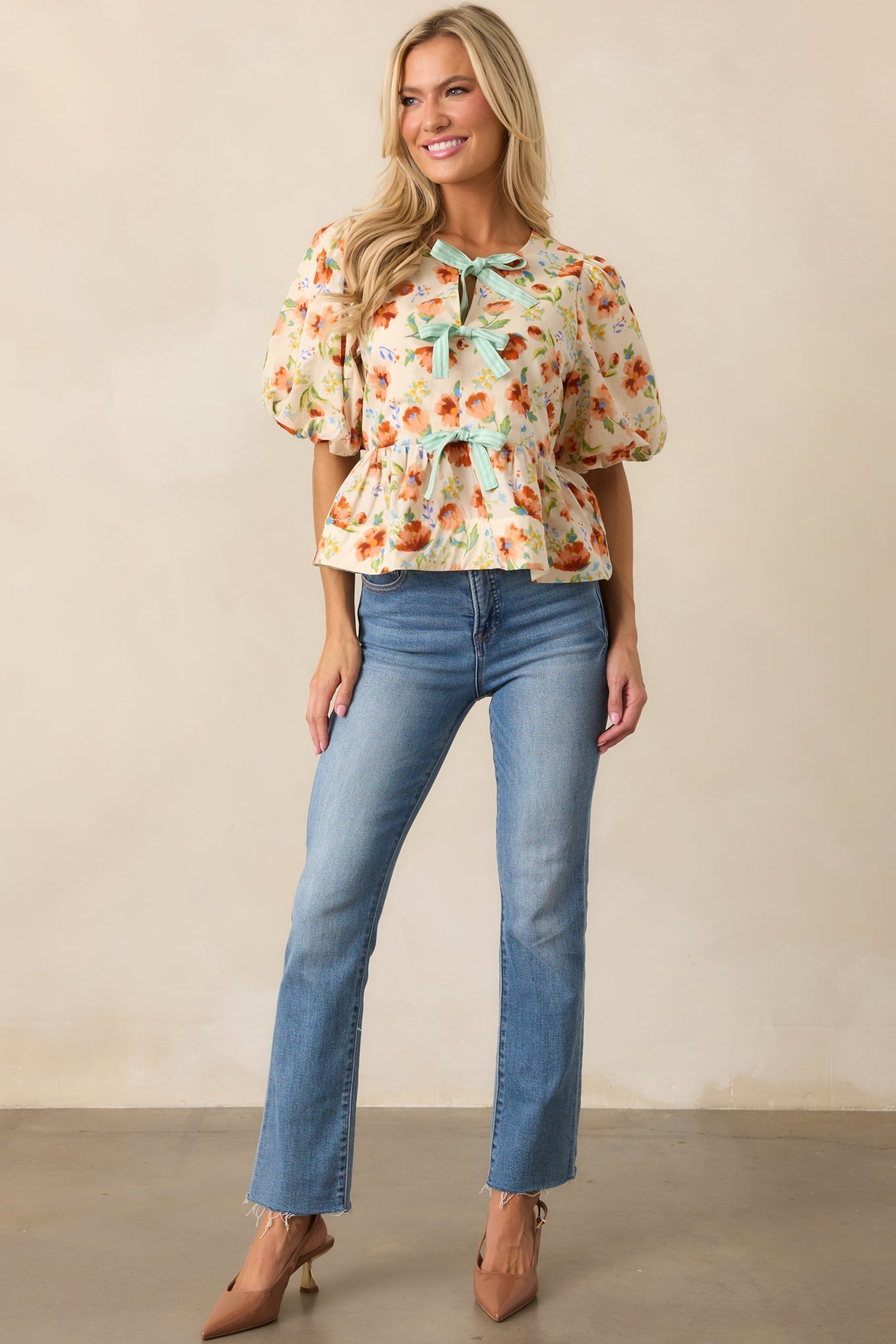 Beyond Compare Ecru Floral Cotton Bow Front Peplum Top