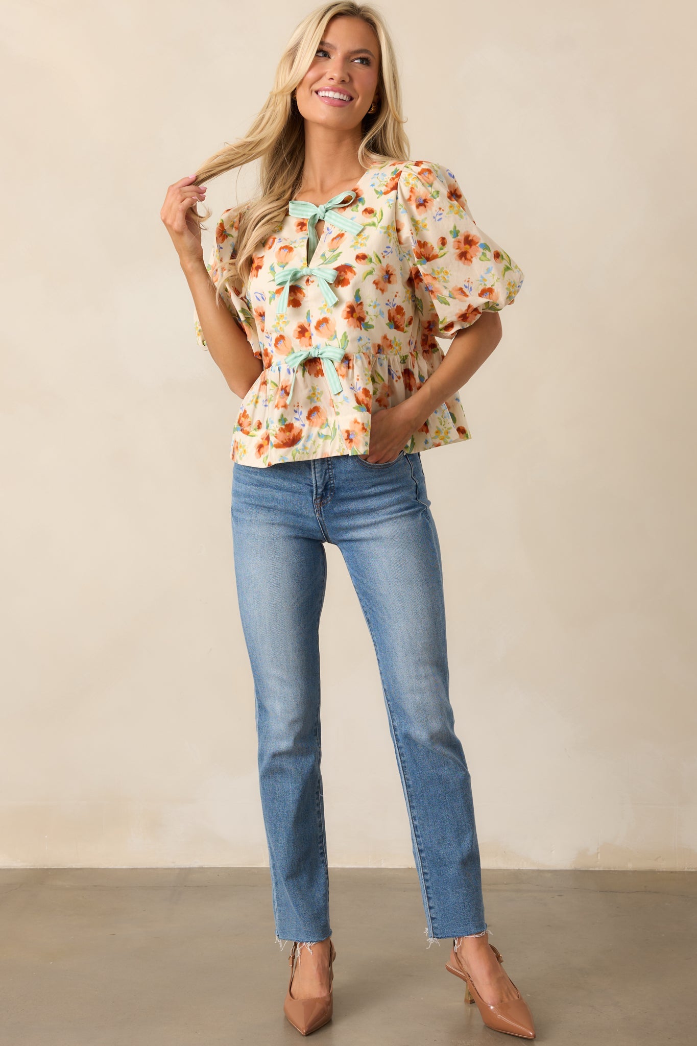 Beyond Compare Ecru Floral Cotton Bow Front Peplum Top